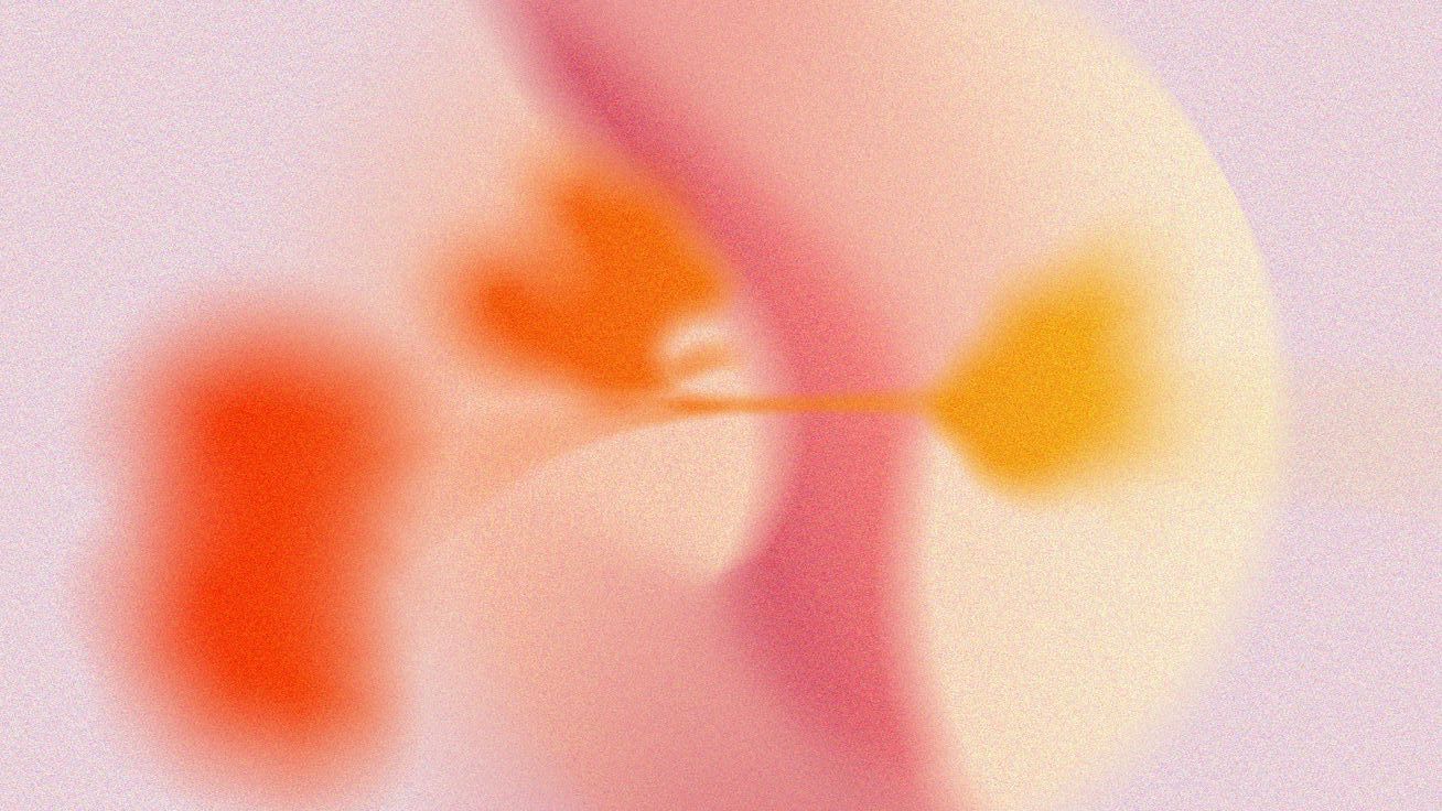 Abstract mood image showing a colorful aura in pink, yellow, red, orange, and purple.